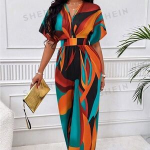 Beautiful multicolored jumpsuit! Great for the upcoming holidays…